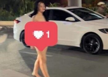 Cô gái xinh đẹp khỏa thân đi dưới lòng đường Nguyễn Trãi